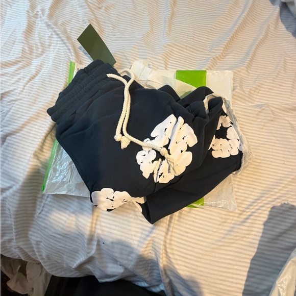 Men's Black Sweatpants with White Floral Design